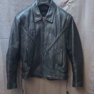 Interstate Leathers women's black leather motorcycle jacket.